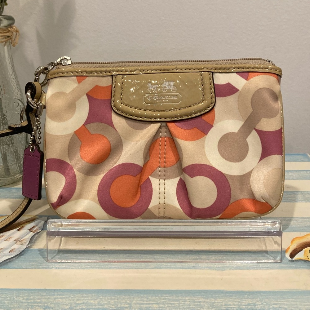 Coach Signature Optic C patent trim wristlet orange, magenta, tan and cream